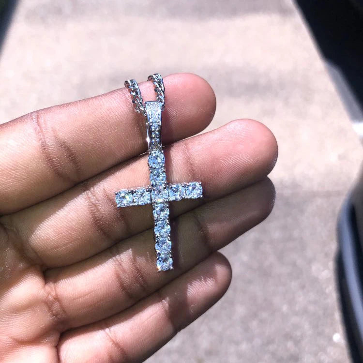 Model holding Cross Pendant Necklace on his palm