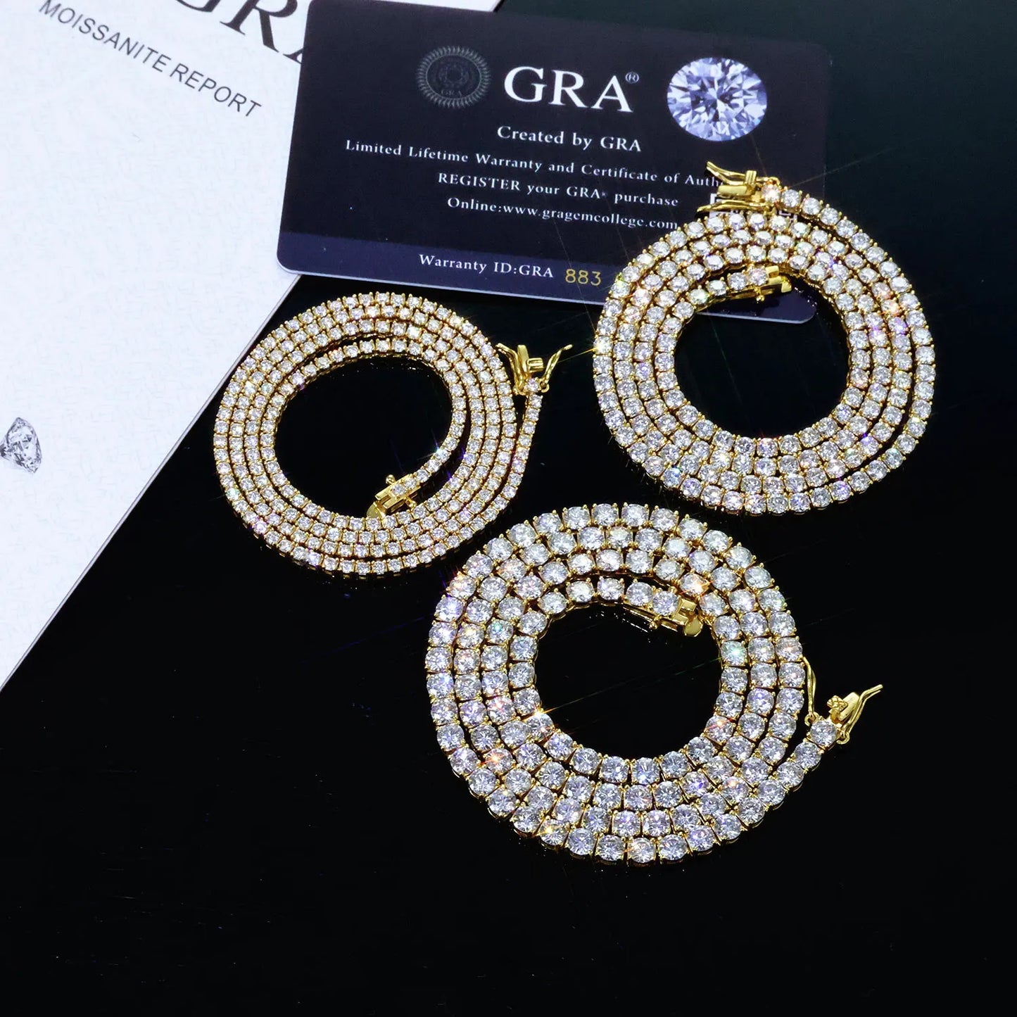 VVS Moissanite Tennis Chain earrings displayed with GRA certificate and warranty, showcasing luxury jewelry design.