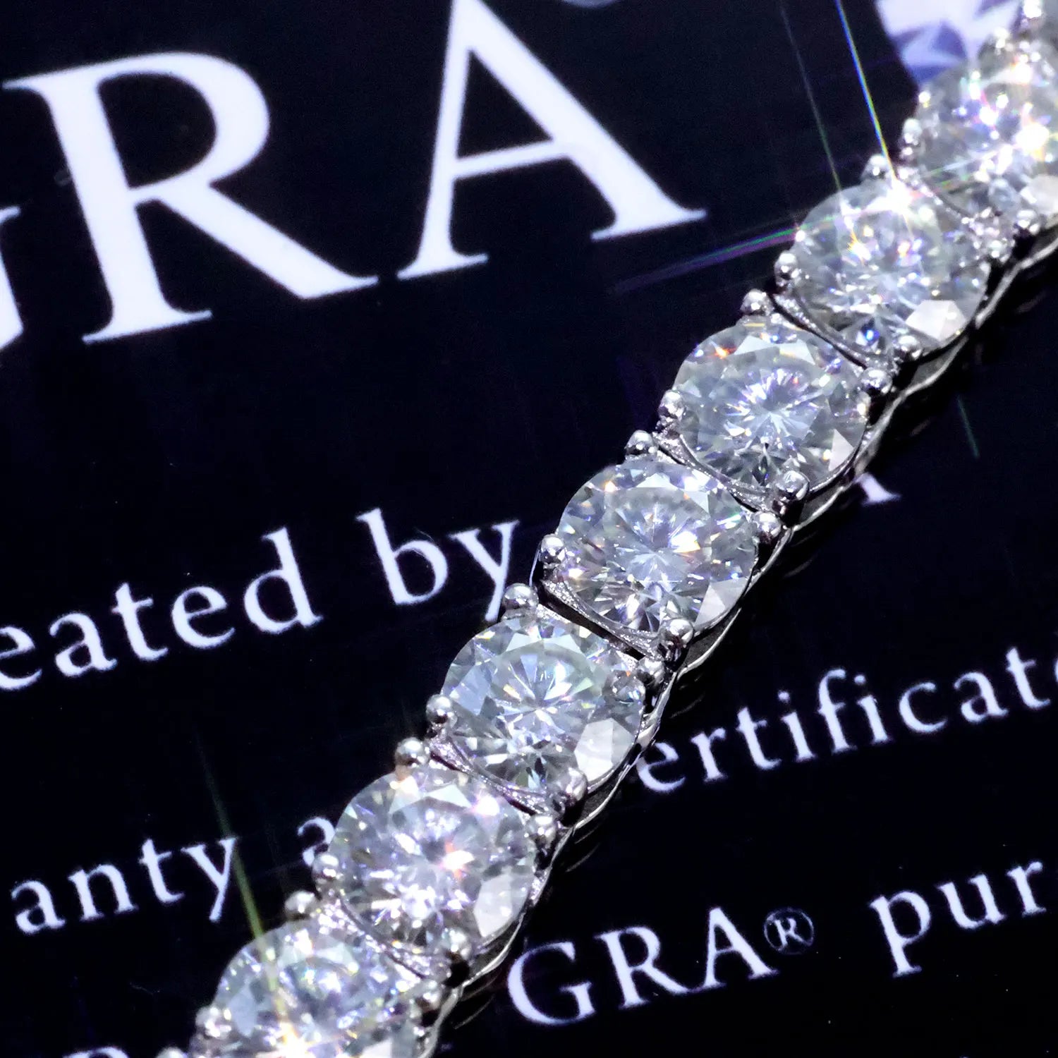 VVS Moissanite Tennis Chain with sparkling stones showcasing luxury and brilliance on a certificate background.